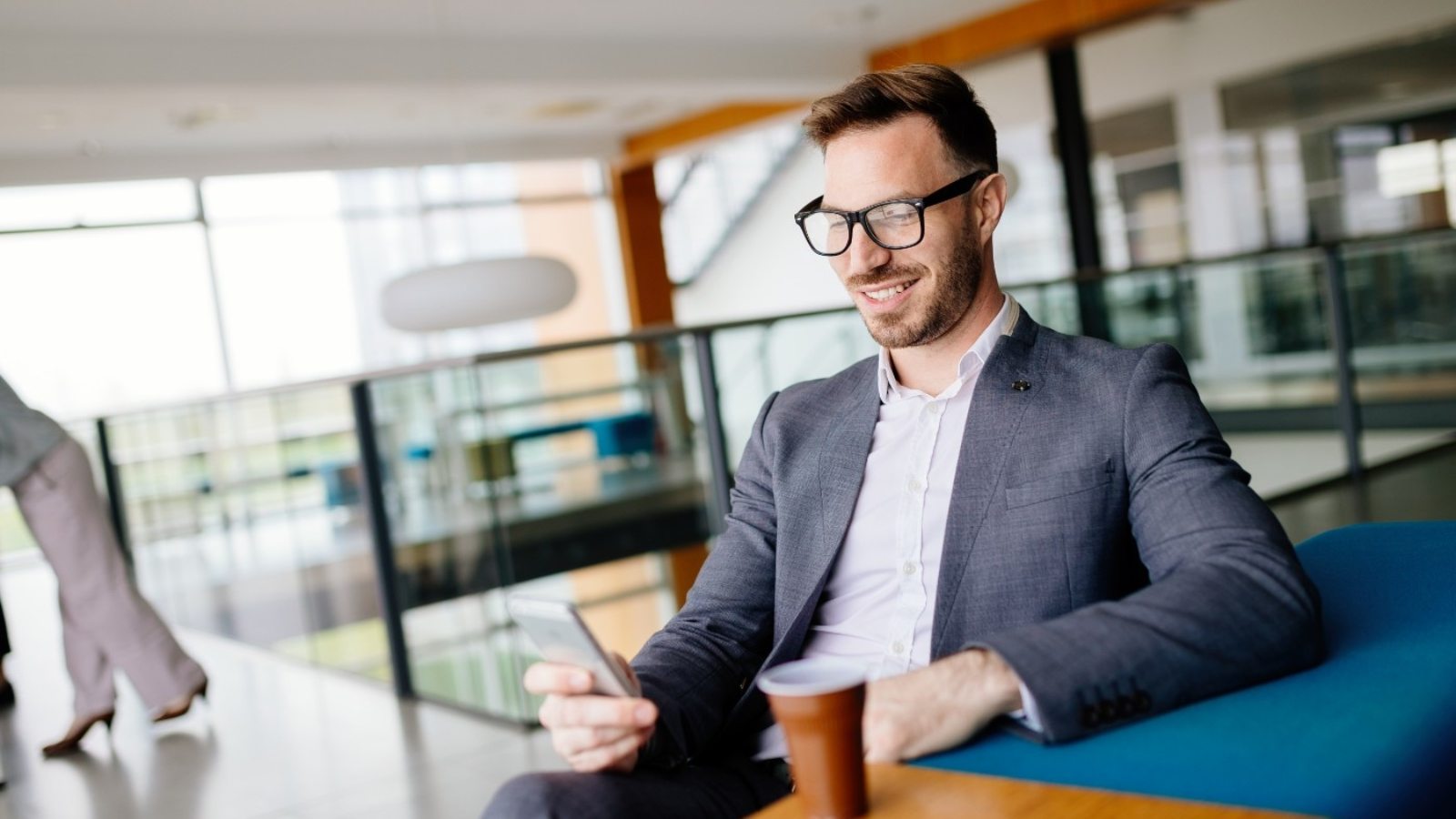 businessman-taking-a-break-with-a-cup-of-coffee-JW4B3DH